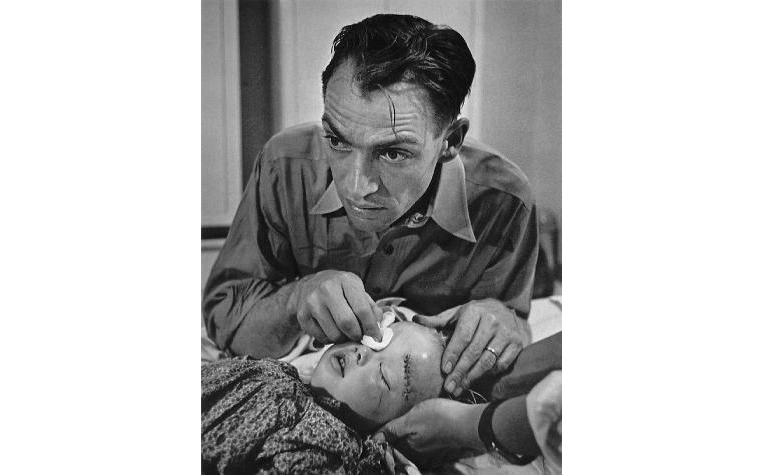 William Eugene Smith Doctor Ceriani with injured child, 1948